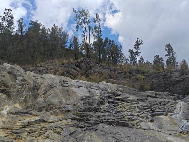 steep rock formation, which was partially destroyed, is a waterfall tourist attraction