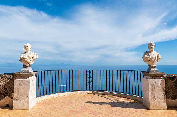 istock Iron balustrade surrounded by two white bust statues, Cimbrone Villa, Italy 2236580995