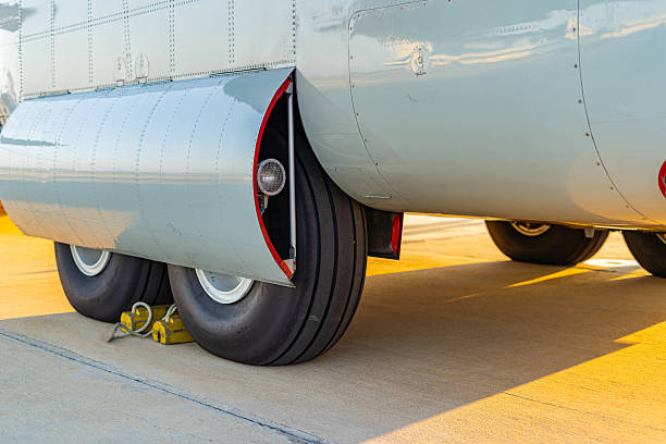 istock Airplane wheels parked at the airport 2236581035