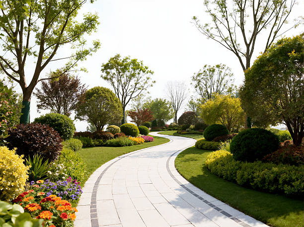 istock Scenic Serpentine Path with Colorful Landscaping 2236582311