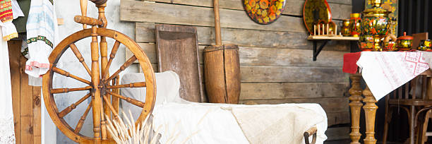 istock Traditional Russian spinning wheel and samovar. Interior with folk crafts and rustic objects. Russian heritage concept. 2236582792