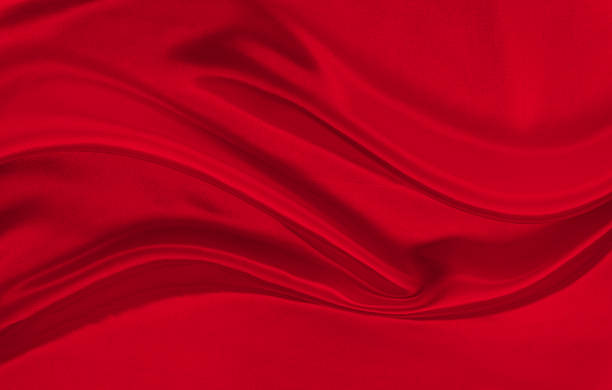 istock Black red satin dark fabric texture luxurious shiny that is abstract silk cloth background with patterns soft waves blur beautiful. 2236588648