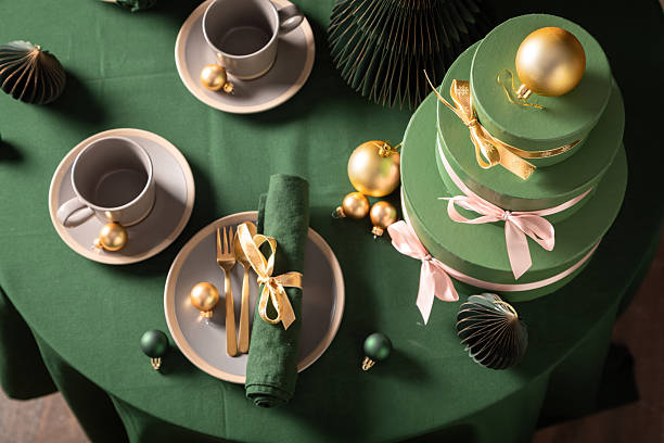 istock Unique green Christmas table set with Christmas decorations. 2236588817