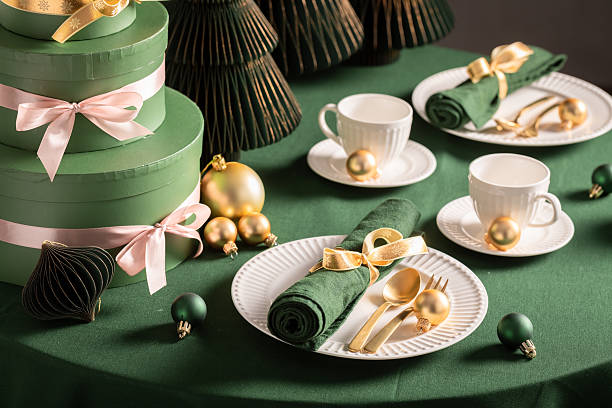 istock Unique green Christmas table set with decorations and baubles. 2236588939
