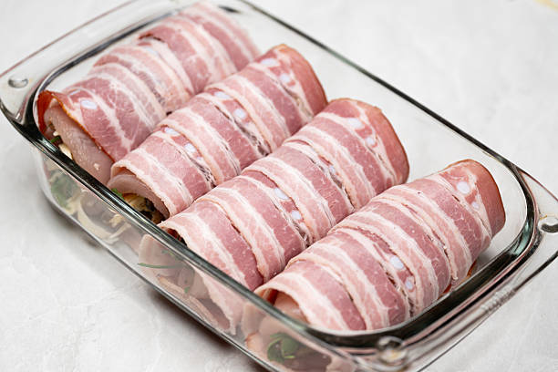 Rolled Chicken Breast with Bacon and Vegetable Filling.