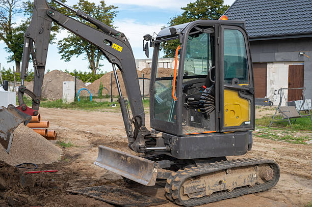 istock Compact Excavator at Residential Construction Site with Open Cabin and Track System. 2236600997