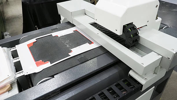 istock An industrial flatbed cutting and printing machine in operation. 2236608079