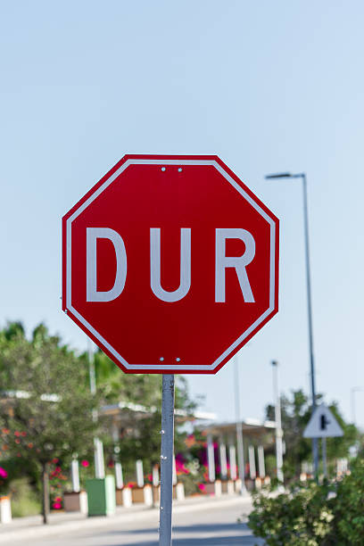 istock Red Octagonal Sign with White Lettering 