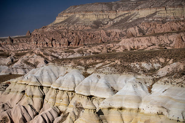 Views of cappadocia and caves in it. Mountains, rocks, caves and sands. Buildings in caves, High quality photo