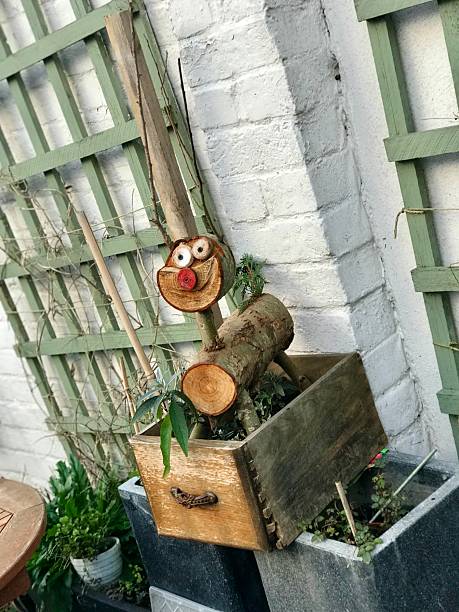 istock Decorative Wooden Log Sculpture with Eyes and Smile 2236620651
