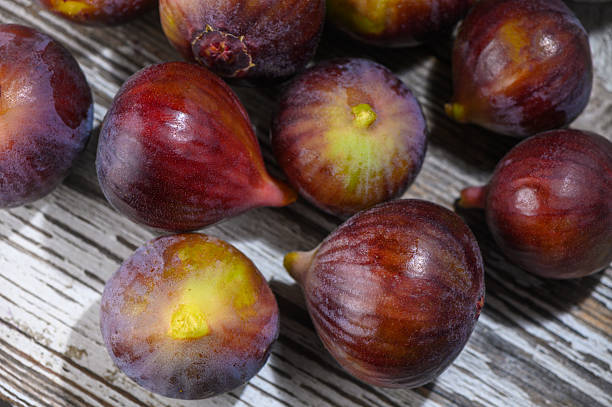 istock Ripe Cypriot Fig on Rustic Wooden Table 2236620709