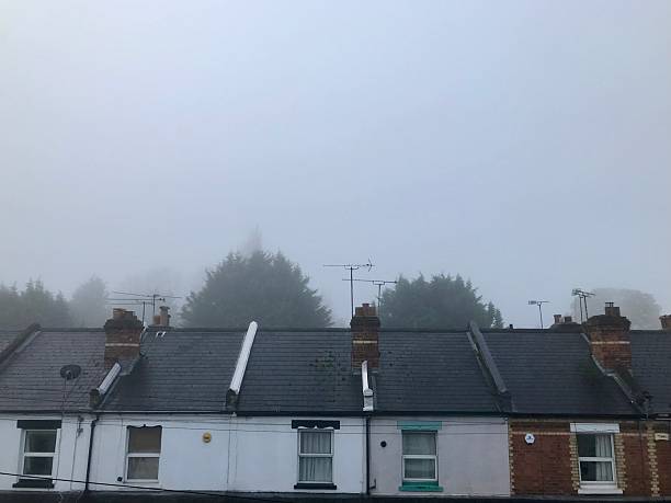 istock Foggy Morning Over Residential Rooftops 2236621332