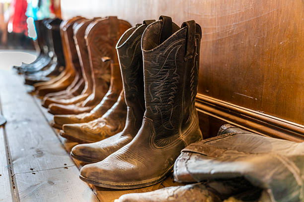 istock Black and brown cowboy shoes in a raw 2236623018