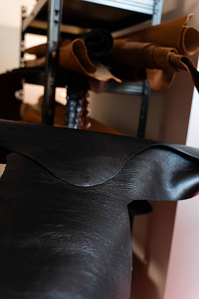 istock Leather Hide Selection in Workshop. Rolled hides in varied tones and grains emphasize diversity, offering craftsmen multiple options for unique and timeless leatherwork. 2236625877