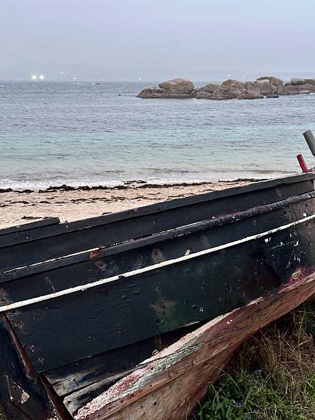 istock A rowboat stranded on a beach in Galicia. 2236631912