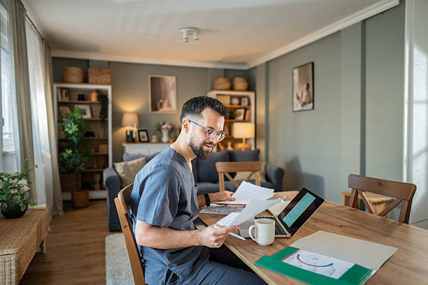 istock Healthcare professional working remotely from home office desk 2236633743
