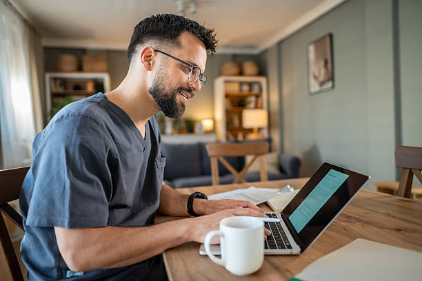 istock Healthcare professional working from home using laptop 2236633766