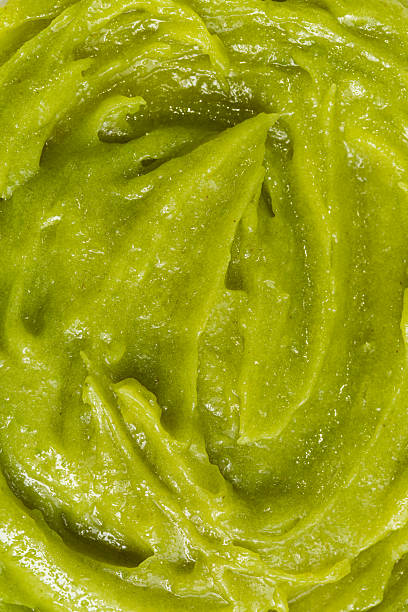 Macro green wasabi fine texture,Sushi sauce, wasabi, Japanese horseradish, emphasizing extra smoothness.