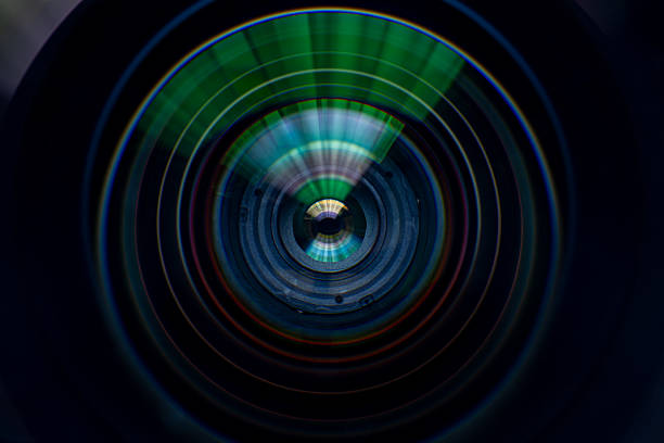 istock Close-up macro digital camera lens,Photo or video camera lens with light reflections close-up on the black background. 2236642032