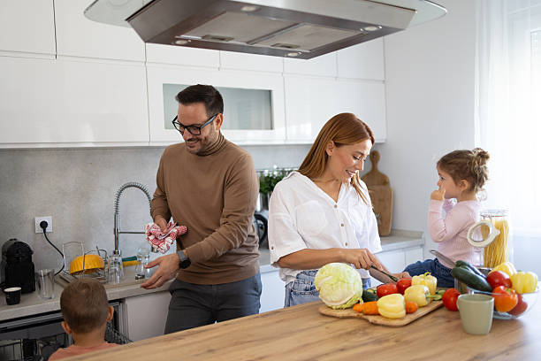 istock Family Bonding Over a Meal Prep in a Bright Space 2236645283