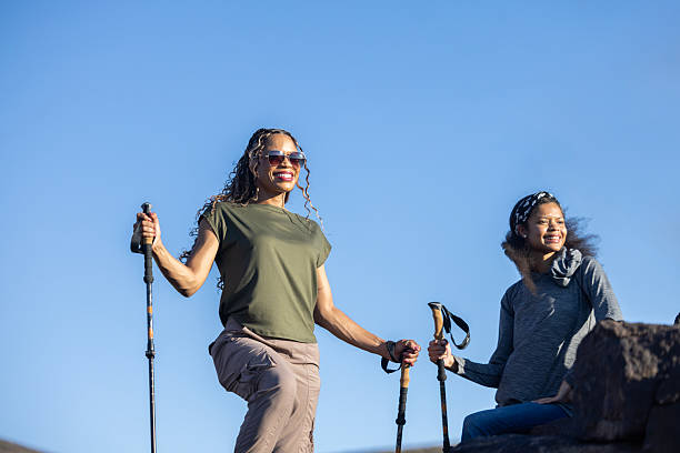 istock Mother and daughter hiking 2236649010