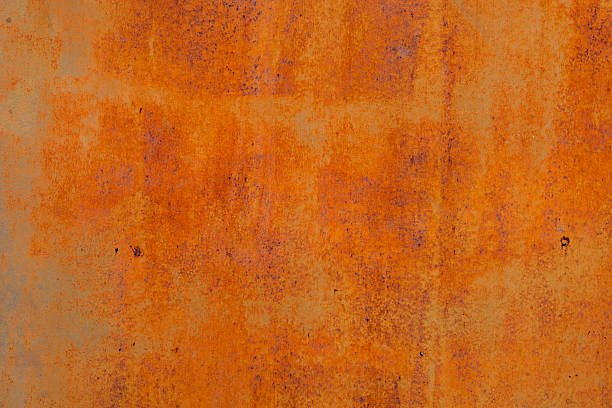 istock Rusty Metal Surface With Orange And Brown Tones 2236649533