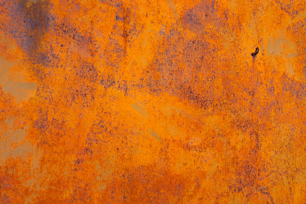 istock Rusty Metal Surface With Orange And Brown Tones 2236649643