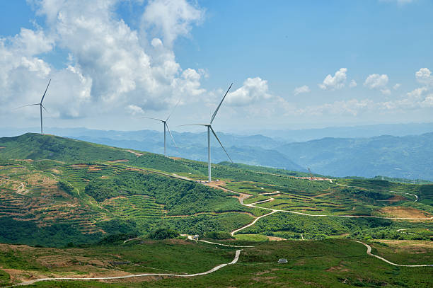 istock Wind turbines generating clean energy on a green mountain landscape 2236650422