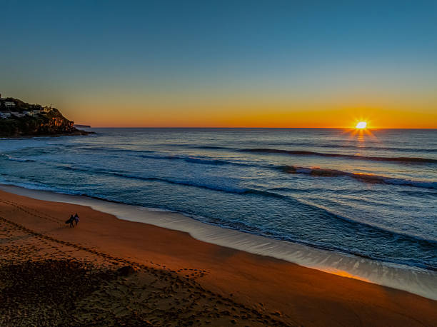 istock Sunrise at the seaside with a cloudless sky 2236650709
