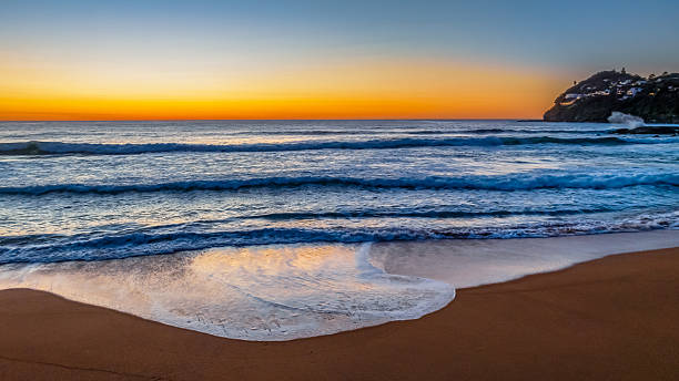 istock Sunrise at the seaside with a cloudless sky 2236650710