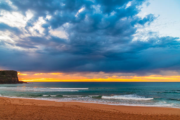 Ocean sunrise over the tropical sea shore and exotic beach