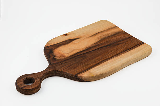 istock Beautiful wooden cutting board displayed on a clean surface 2236651016