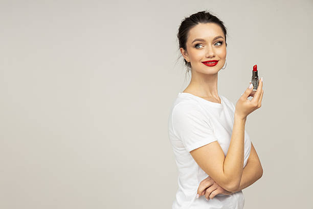 istock Attractive brunette with lipstick, place for text 2236653999
