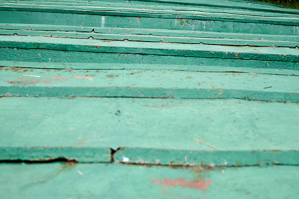 Weathered green corrugated metal surface creating a textured background