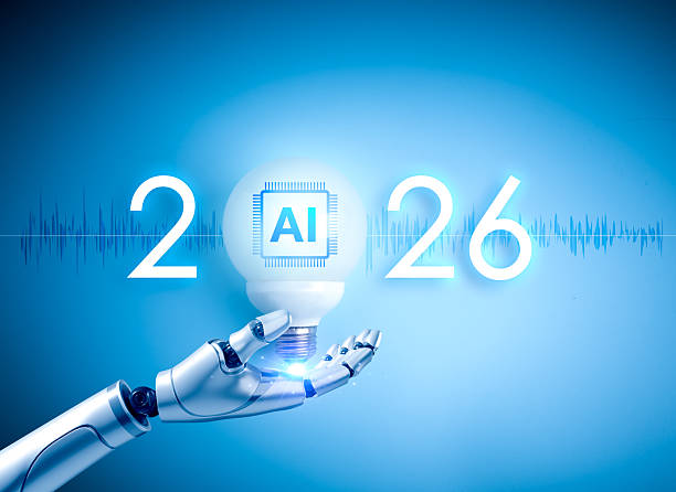 istock Futuristic robotic hand holding big glowing AI light bulb with new year 2026 text, symbolizing advanced artificial intelligence and innovation in future technology trends and digital transformation. 2236656308