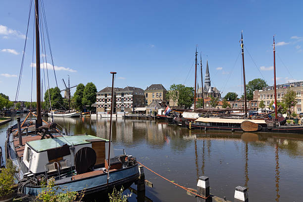 istock Historic sailing ships moored in Museum harbor in Gouda. 2236663586