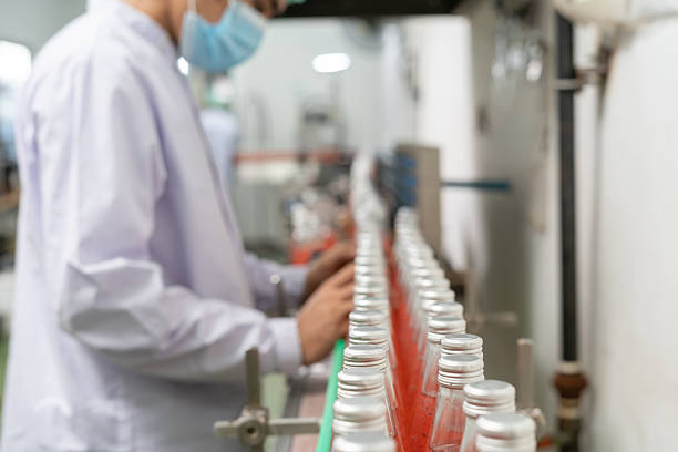 istock quality supervisor or food or beverages technician inspection about condition control food or beverages before send product to the customer. Production leader recheck machine and productivity. 2236664126