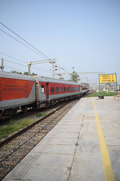 istock Amritsar, India, Aug 15 2025 - Indian railway train at Amritsar railway station platform during morning time, Colourful train at Amritsar, Punjab railway station 2236665025