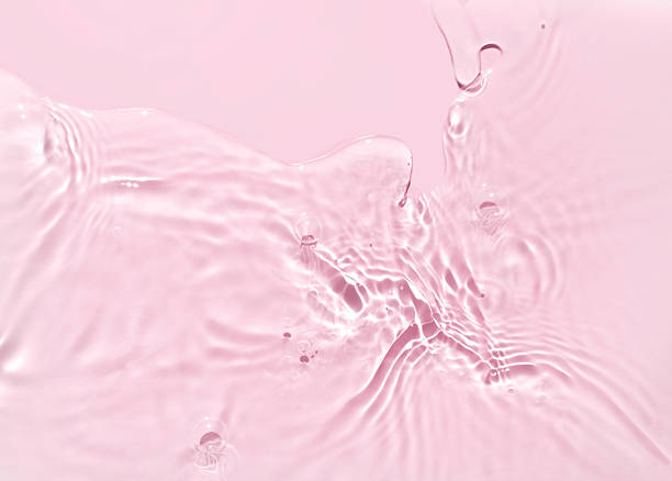 istock water texture ripple wave clean transparent water drops abstract pink background 2236669951