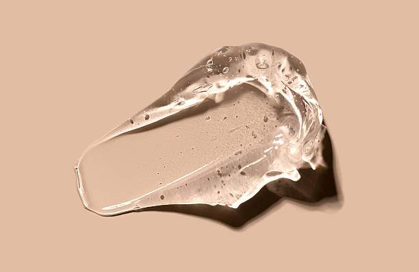 istock cosmetic texture gel essence smears on a beige background close-up 2236669962