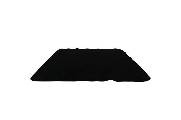 istock Abstract monochromatic mound of dark material on a pure white backdrop minimal 50 characters 2236671789