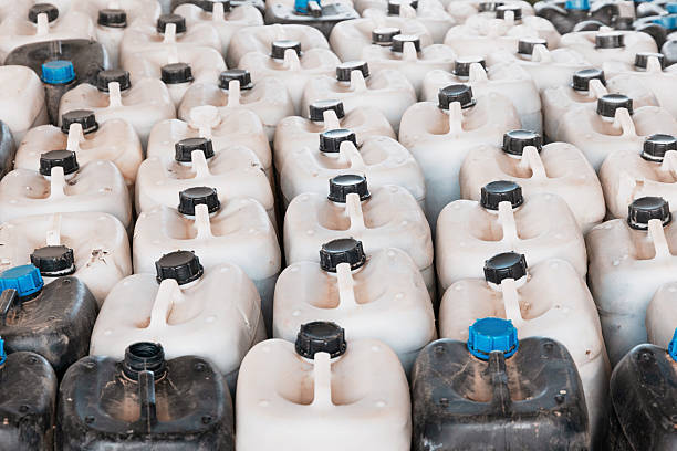 istock Many plastic containers are storing chemicals, forming a repetitive pattern in an industrial setting 2236672852