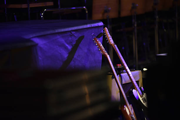 Close up man playing electric guitar