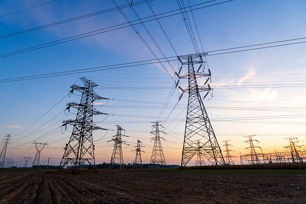 istock Pylons, high voltage pylons in the evening 2236673639