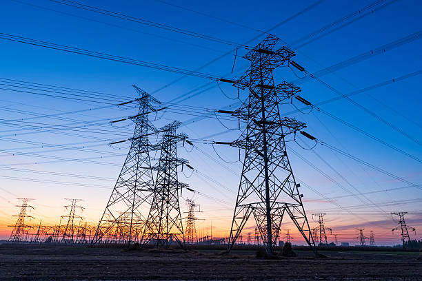 istock Pylons, high voltage pylons in the evening 2236673640