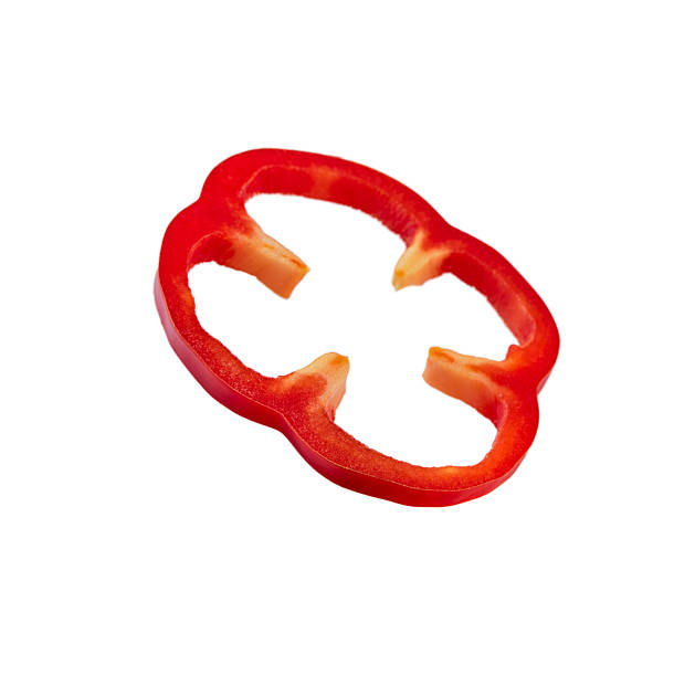 istock Red bell pepper portion on isolated white background with clipping path. Close up background and texture of green leaves cut cabbage. Food background. Top view. 2236674529