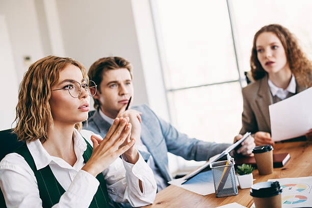 istock Professional business team having a productive meeting in a modern office environment emphasizing teamwork and collaboration 2236678212