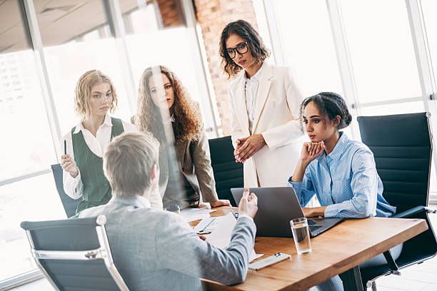 istock Professional team discussing project in modern office environment with focus on collaboration, strategy, and teamwork 2236678245
