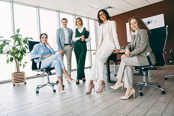 istock Professional team of coworkers collaborating in a modern office setting 2236678312