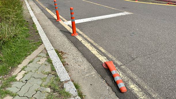 istock Traffic poles on the road, one pole is broken. 2236678503